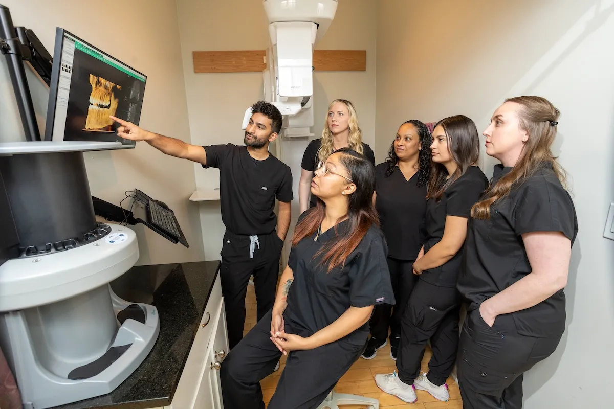 Big City Dental team reviewing a 3D dental scan together