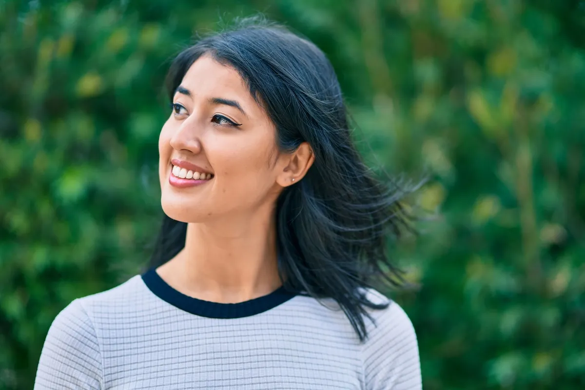 Woman smiling outdoors