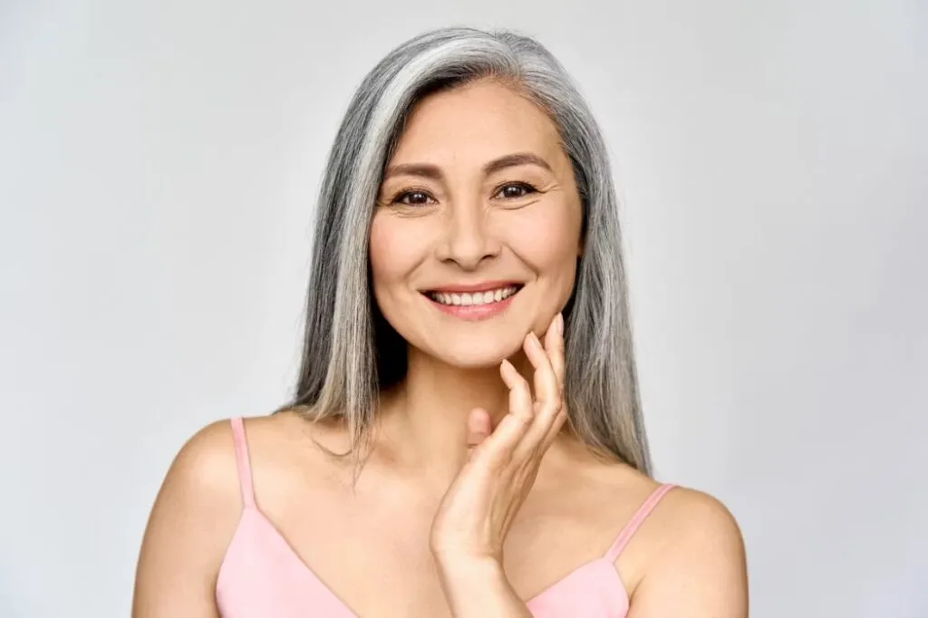 Woman with silver hair smiling